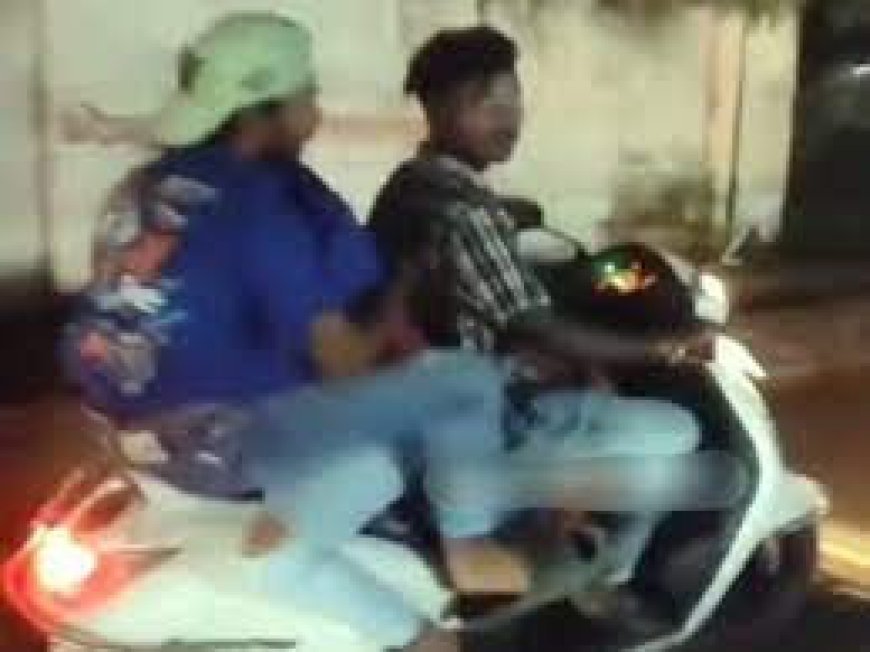 स्कूटी पर कपल का रोमांस:बॉयफ्रेंड ने गर्लफ्रेंड को लगाया गले, दोस्त चला रहा था गाड़ी;12 हजार 500 का चालान कटा तो मांगी माफी